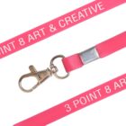 Pink lanyard with metal clip, labeled 3 Point 8 Art & Creative.