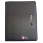 A sleek black portfolio with a curved metal clasp on the front. The lower right corner features a red and white logo with the text Asset Financial Services.