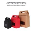 Three nested gift boxes: black, red, and brown, with cutout handles and windows.