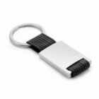 Silver and black rectangular keychain with a metal ring and fabric strap.