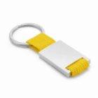 Silver keychain with a yellow fabric strap looped through a rectangular metal plate.