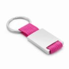 Silver keychain with a pink fabric loop and a rectangular metal plate.