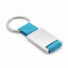 Silver keychain with a blue fabric strap and a rectangular metal plate.