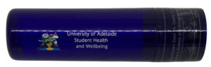 Blue lip balm custom branded with university logo.
