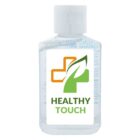 Clear bottle of hand sanitizer labeled Healthy Touch with a green and orange cross logo.