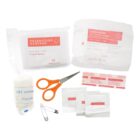 First aid supplies including bandages, scissors, and safety pins on a white background.