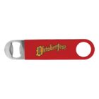 A red bottle opener with a metal tip and hole features the word Oktoberfest in yellow Gothic-style font on the handle.