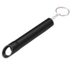 Black metal keychain tool with a hollow end, attached to a silver key ring.