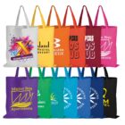 Colorful tote bags in two rows, each with different logos and text printed on them.