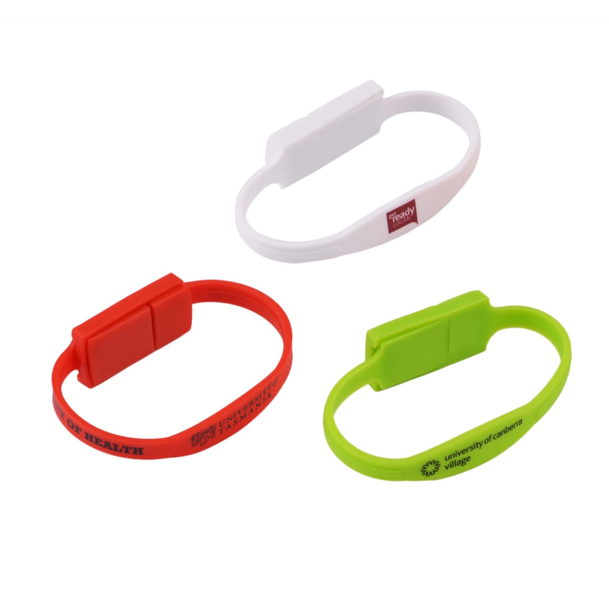 Three colorful silicone USB wristbands: white, red, and green.