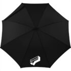 Black umbrella with brood logo near the edge, viewed from above.