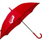 Red umbrella with a curved handle and a logo that says brood.