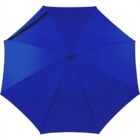 A blue umbrella viewed from above, fully opened.