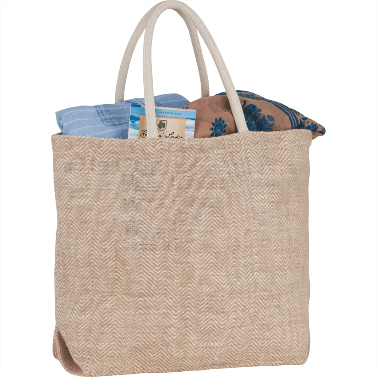 Beige tote bag with blue and brown patterned fabric inside.