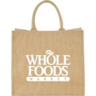 A jute tote bag with the Whole Foods Market logo in white.