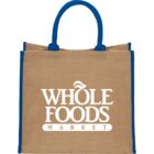 Beige and blue reusable grocery bag with Whole Foods Market logo.
