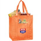 Orange Rite Aid bag filled with snacks and drinks.