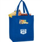 Blue tote bag with Rite Aid logo, filled with groceries and magazines.