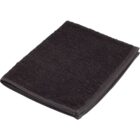 A folded black towel on a white background.