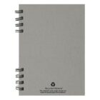 Gray spiral notebook with a recycled material symbol on the cover.