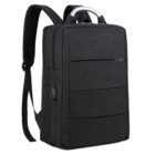 A sleek, dark grey backpack with padded shoulder straps and a sturdy top handle. It features multiple zippered compartments and a USB charging port on the side. The design is minimalist and modern.