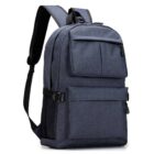 A gray laptop backpack with multiple compartments and a zippered front pocket. The bag has adjustable shoulder straps and a side mesh pocket. The fabric has a subtle texture, giving it a modern look.