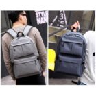 Two images of people wearing backpacks. The left person wears a gray backpack and brown sweater, with their back turned. The right person holds a blue backpack while wearing a white shirt, with part of their back visible. Both are outdoors.