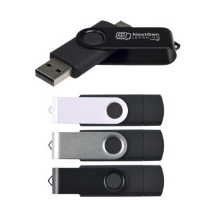 A display of four promotional USB flash drives in different colors: black, white, silver, and dark green. The black drive is open, showcasing the USB connector along with the NextGen Learning logo for enhanced brand awareness.