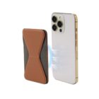 Magnetic brown wallet case attaches to back of gold smartphone with electricity effect.