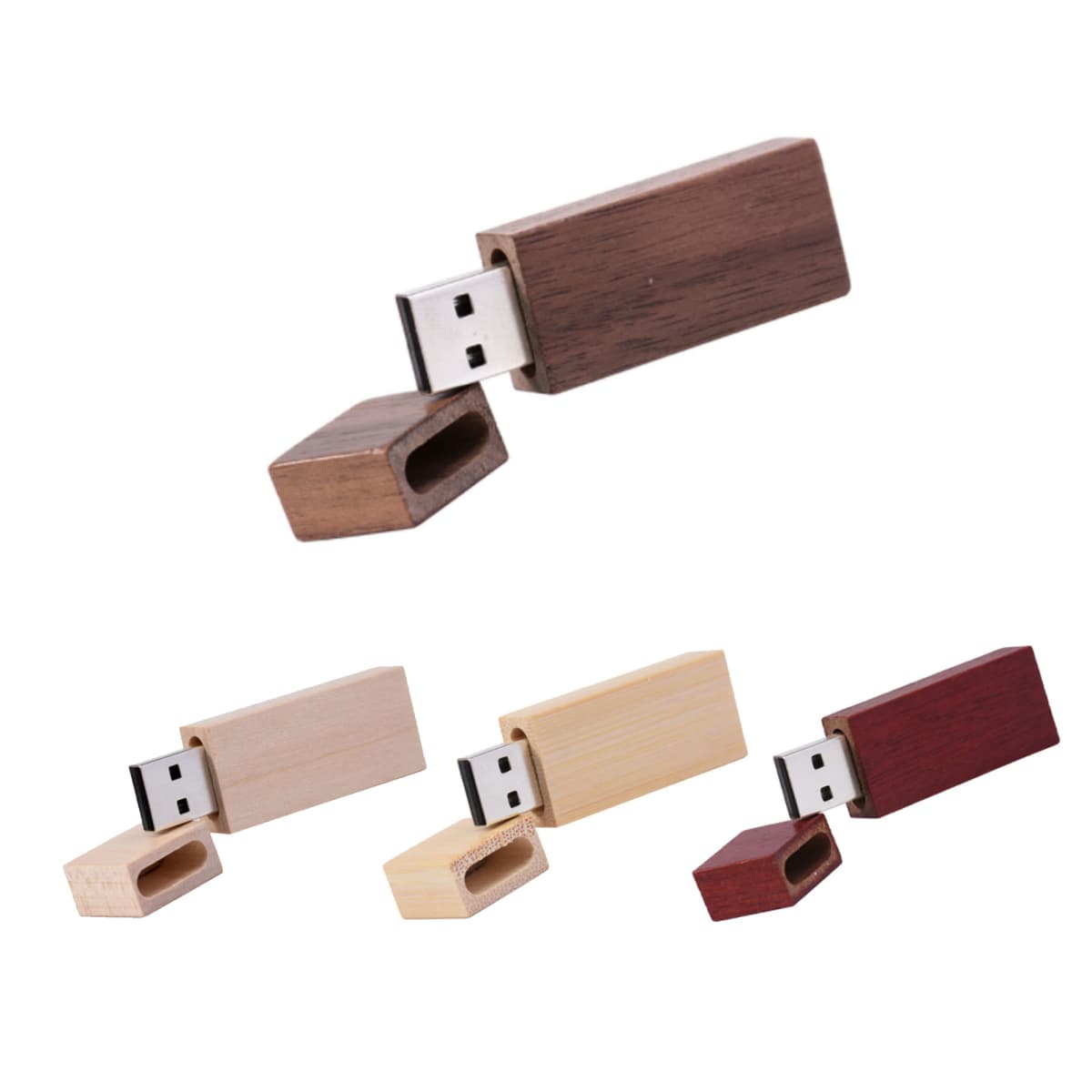 Wooden USB flash drives in different shades with their caps removed.