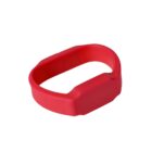 Red silicone ring with an oval shape and a rectangular flat section.