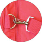 Three circular images of a red bag: the first shows a small handle, the second shows a metal hook clip on a strap, and the third shows a mesh compartment with a yellow hat inside.