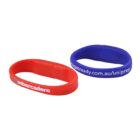 Two silicone wristbands: one red with embarcadero, one blue with yougotready.com.au/uniprep.