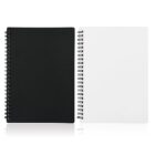Two spiral-bound notebooks on a white background. The left notebook has a black cover, and the right notebook has a white cover. Both are closed, with the spirals visible on the left side of each notebook.