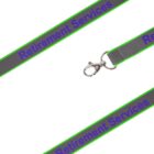A gray lanyard with green edges, featuring the text Retirement Services in purple. It has a metal clasp for attaching items. The arrangement forms an incomplete square shape on a white background.