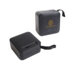 Two black portable speakers with perforated fronts and carrying straps.