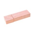Wooden USB stick with a detachable cap.
