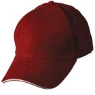 A red baseball cap with a curved visor and metal eyelets.