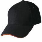 Black baseball cap with orange trim on the edge of the brim.