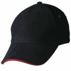 Black baseball cap with a red-edged brim on a white background.