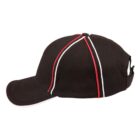 Black cap with red and white stripes, side view.