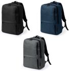 Three backpacks in black, blue, and gray, each with two zippered compartments.