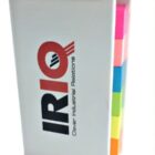Notebook with colorful sticky tabs and IRIO logo on the cover.