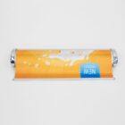 Banner with orange background, milk splash, oats, and New Product text.