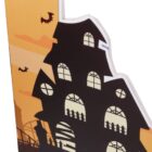 Silhouette of a haunted house with bats flying on a yellow-orange sky.
