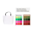 White tote bag with color swatches on white and brown paper backgrounds.