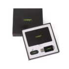 Gift set with black notebook, pen, and USB drive in branded Cumbria box.