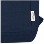 Close-up of a navy fabric with a white label reading Recycled Cotton.