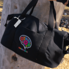 A black duffel bag with a brain and gears design and the word BRAINSTORM on it.