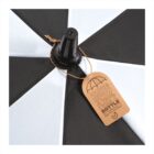 Black and white umbrella with a brown tag that reads, Once upon a time I was a bottle.